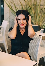 Ukrainian mail order bride Irina from Desenzano del Garda with black hair and green eye color - image 13
