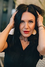 Ukrainian mail order bride Irina from Desenzano del Garda with black hair and green eye color - image 16