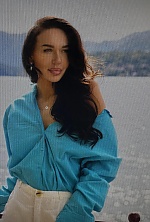 Ukrainian mail order bride Irina from Uzhhorod with light brown hair and green eye color - image 9