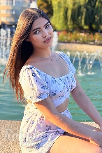 Ukrainian mail order bride Vlada from Cherkasy with black hair and hazel eye color - image 1