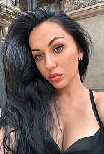 Ukrainian mail order bride Vladyslava from Tbilisi with black hair and green eye color - image 12