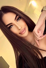 Ukrainian mail order bride Sandra from Tbilisi with black hair and green eye color - image 9
