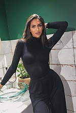 Ukrainian mail order bride Sandra from Tbilisi with black hair and green eye color - image 7