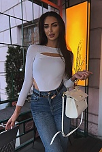 Ukrainian mail order bride Sandra from Tbilisi with black hair and green eye color - image 19