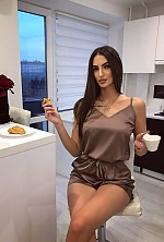 Ukrainian mail order bride Sandra from Tbilisi with black hair and green eye color - image 13