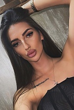Ukrainian mail order bride Sandra from Tbilisi with black hair and green eye color - image 6