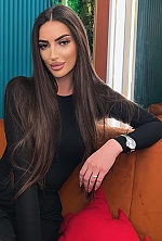 Ukrainian mail order bride Sandra from Tbilisi with black hair and green eye color - image 16