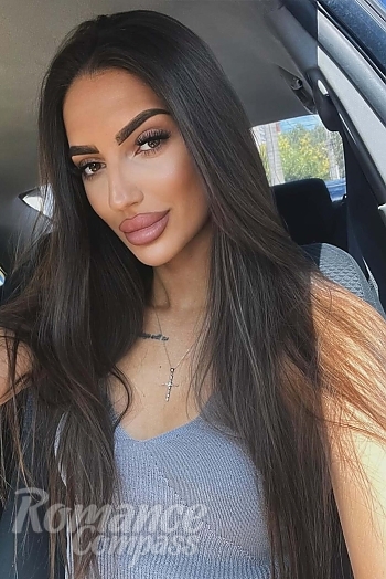 Ukrainian mail order bride Sandra from Tbilisi with black hair and green eye color - image 1