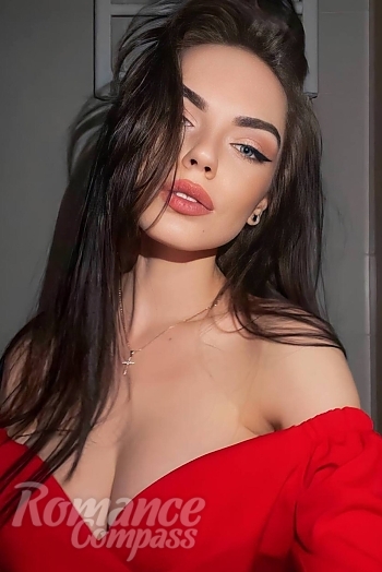 Ukrainian mail order bride Natalia from Kyiv with brunette hair and green eye color - image 1