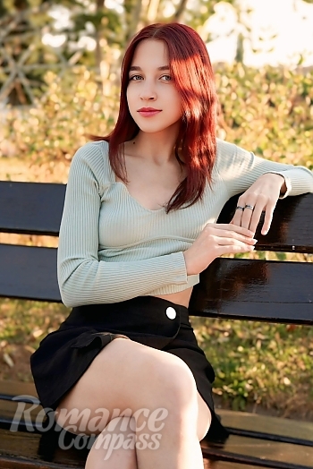 Ukrainian mail order bride Viktoriia from Cherkasy with red hair and green eye color - image 1