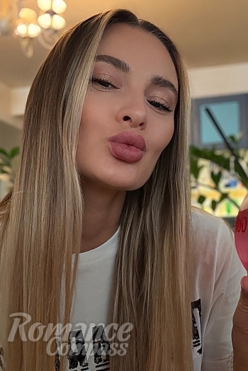 Ukrainian mail order bride Anastasia from Kyiv with light brown hair and brown eye color - image 1