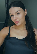 Ukrainian mail order bride Daria from Rivne with black hair and brown eye color - image 5
