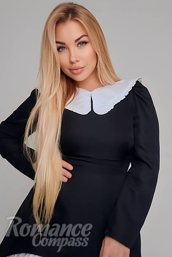 Ukrainian mail order bride Olha from Kyiv with blonde hair and grey eye color - image 1