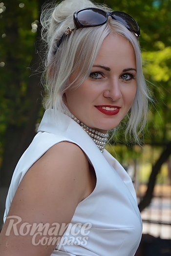 Ukrainian mail order bride Svitlana from Kyiv with blonde hair and green eye color - image 1