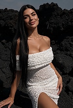 Ukrainian mail order bride Khrystyna from Ivano-Frankivsk with black hair and green eye color - image 3