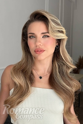 Ukrainian mail order bride Karina from Kyiv with blonde hair and green eye color - image 1
