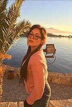 Ukrainian mail order bride Amina from Almaty with brunette hair and brown eye color - image 4