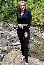 Ukrainian mail order bride Iryna from Kharkiv with light brown hair and green eye color - image 3