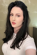 Ukrainian mail order bride Daria from Kyiv with brunette hair and green eye color - image 7