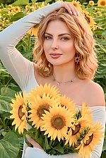 Ukrainian mail order bride Nadia from Zurich with light brown hair and green eye color - image 6