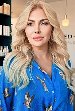 Ukrainian mail order bride Nadia from Zurich with light brown hair and green eye color - image 2