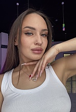 Ukrainian mail order bride Kateryna from Khmelnytskyi with black hair and hazel eye color - image 8