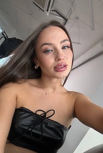 Ukrainian mail order bride Kateryna from Khmelnytskyi with black hair and hazel eye color - image 4
