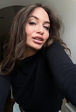 Ukrainian mail order bride Kateryna from Khmelnytskyi with black hair and hazel eye color - image 5