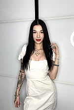 Ukrainian mail order bride Daria from Kremenchug with black hair and green eye color - image 4
