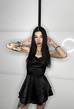 Ukrainian mail order bride Daria from Kremenchug with black hair and green eye color - image 2