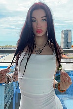 Ukrainian mail order bride Daria from Kremenchug with black hair and green eye color - image 6