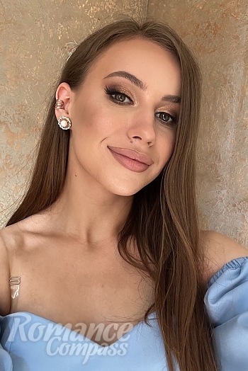 Ukrainian mail order bride Ruslana from Zhytomyr with light brown hair and hazel eye color - image 1