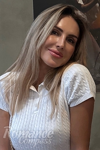 Ukrainian mail order bride Victoriia from Munich with blonde hair and grey eye color - image 1