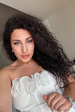 Ukrainian mail order bride Alina from Prague with brunette hair and green eye color - image 3
