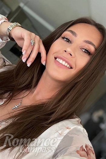Ukrainian mail order bride Valentyna from Saint-Tropez with brunette hair and brown eye color - image 1