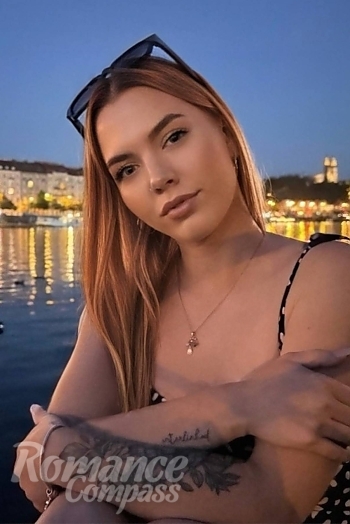 Ukrainian mail order bride Nataliya from Odesa with auburn hair and blue eye color - image 1