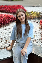 Ukrainian mail order bride Bohdana from Ivano-Frankivsk with light brown hair and blue eye color - image 3