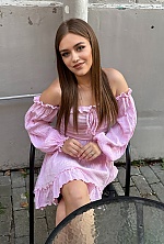 Ukrainian mail order bride Bohdana from Ivano-Frankivsk with light brown hair and blue eye color - image 4