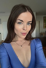 Ukrainian mail order bride Yulia from Kyiv with light brown hair and blue eye color - image 10