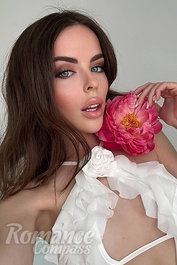 Ukrainian mail order bride Yulia from Kyiv with light brown hair and blue eye color - image 1