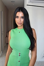 Ukrainian mail order bride Nelia from Sumy with black hair and green eye color - image 5