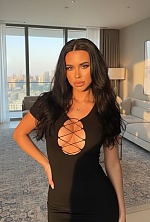 Ukrainian mail order bride Nelia from Sumy with black hair and green eye color - image 4