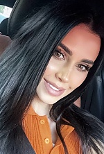 Ukrainian mail order bride Nelia from Sumy with black hair and green eye color - image 6