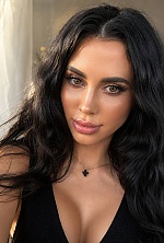 Ukrainian mail order bride Nelia from Sumy with black hair and green eye color - image 2