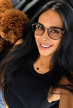 Ukrainian mail order bride Nelia from Sumy with black hair and green eye color - image 3