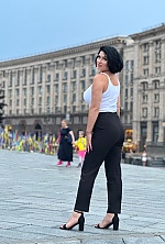 Ukrainian mail order bride Snizhana from Berlin with black hair and green eye color - image 3