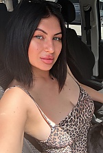 Ukrainian mail order bride Snizhana from Berlin with black hair and green eye color - image 6