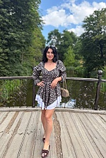 Ukrainian mail order bride Snizhana from Berlin with black hair and green eye color - image 7