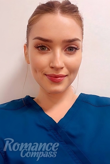 Ukrainian mail order bride Diana from Kyiv with light brown hair and green eye color - image 1