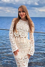 Ukrainian mail order bride Diana from Kyiv with light brown hair and green eye color - image 3